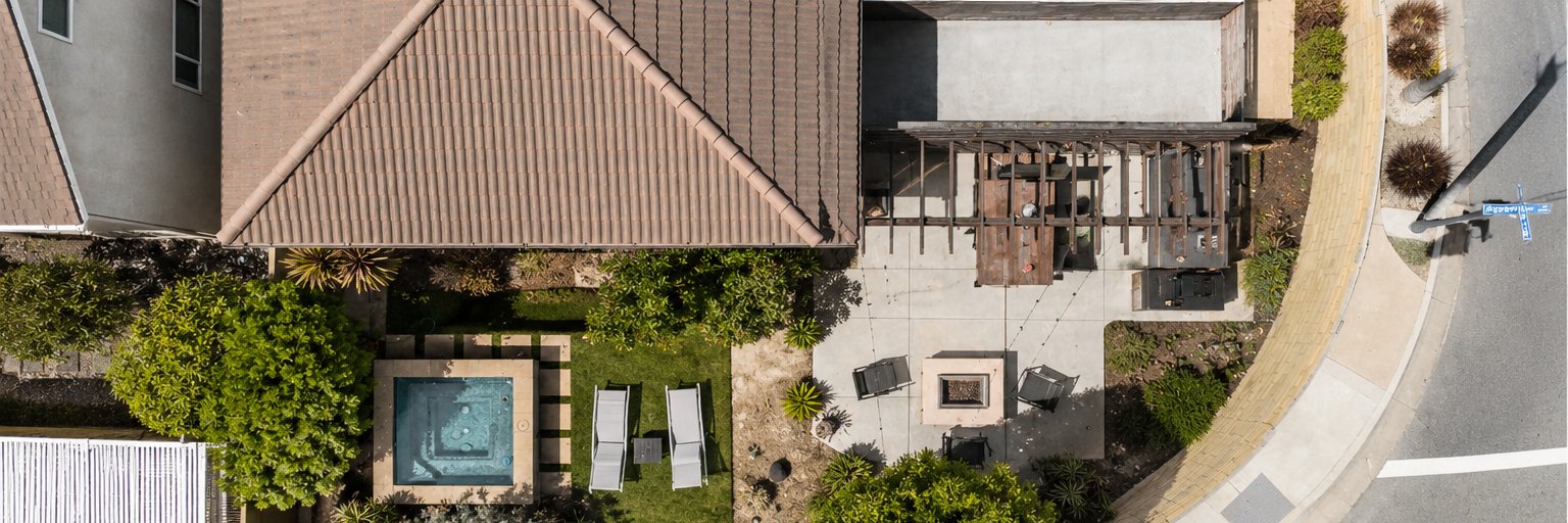 Aerial view — backyard with spa & lounge area
